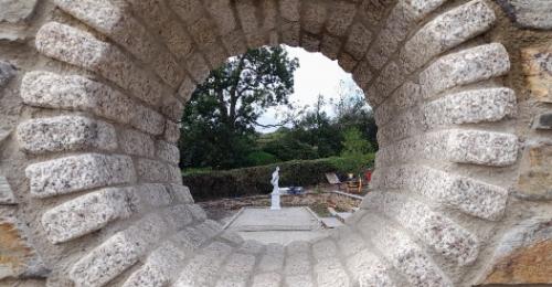 sculpture viewed the circular window