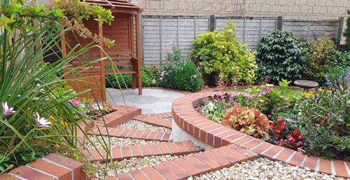 Landscaped garden in Plympton with curved steps